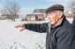 Andrii S., born in 1930, shows our team the place where the 1,700 Jews from the ghetto were taken after the gathering. According to him, the column of Jews was led there on foot and surrounded by guards. ©Les Kasyanov/Yahad – In Unum